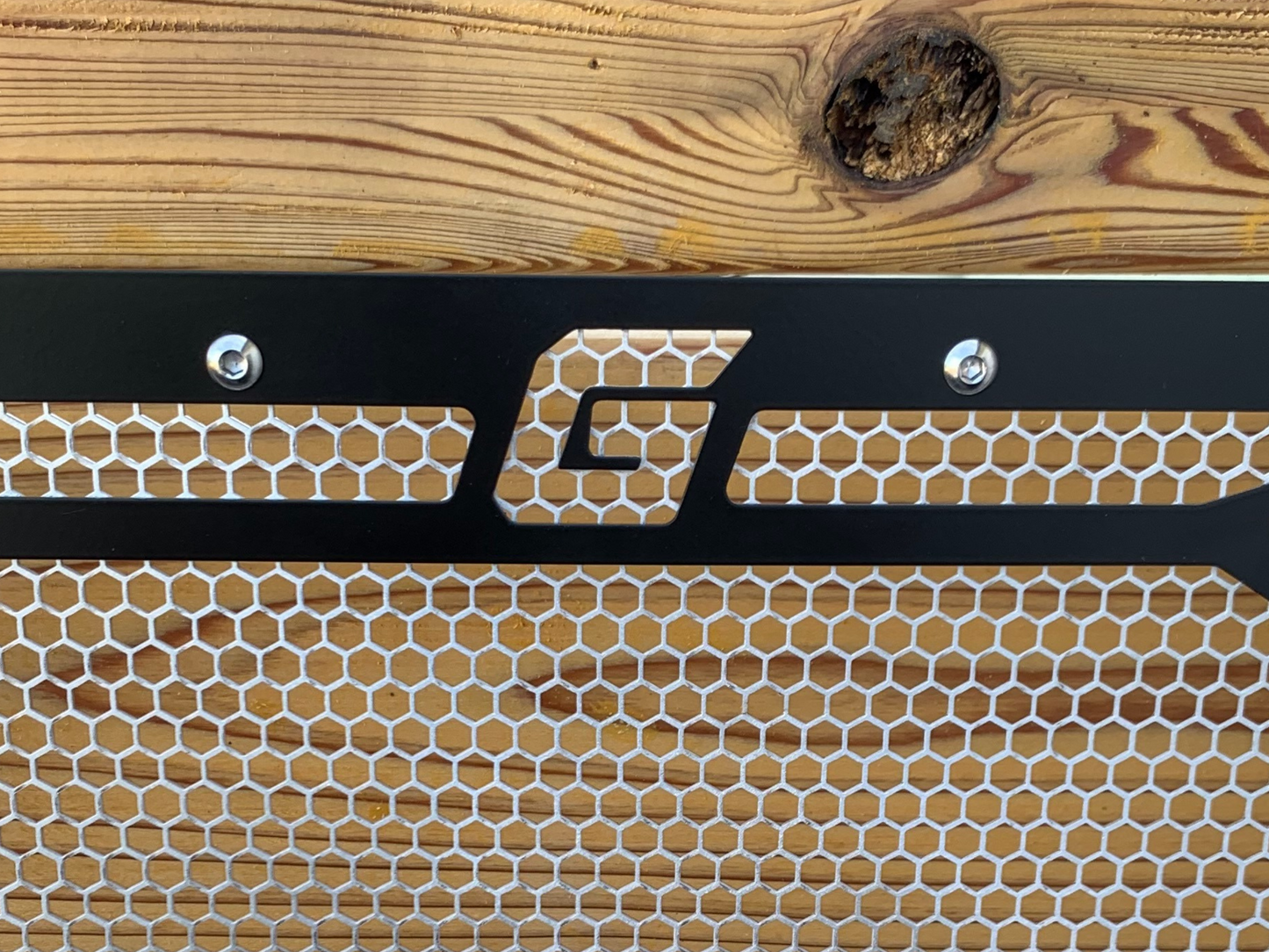 closeup of greanland offroad logo on grille