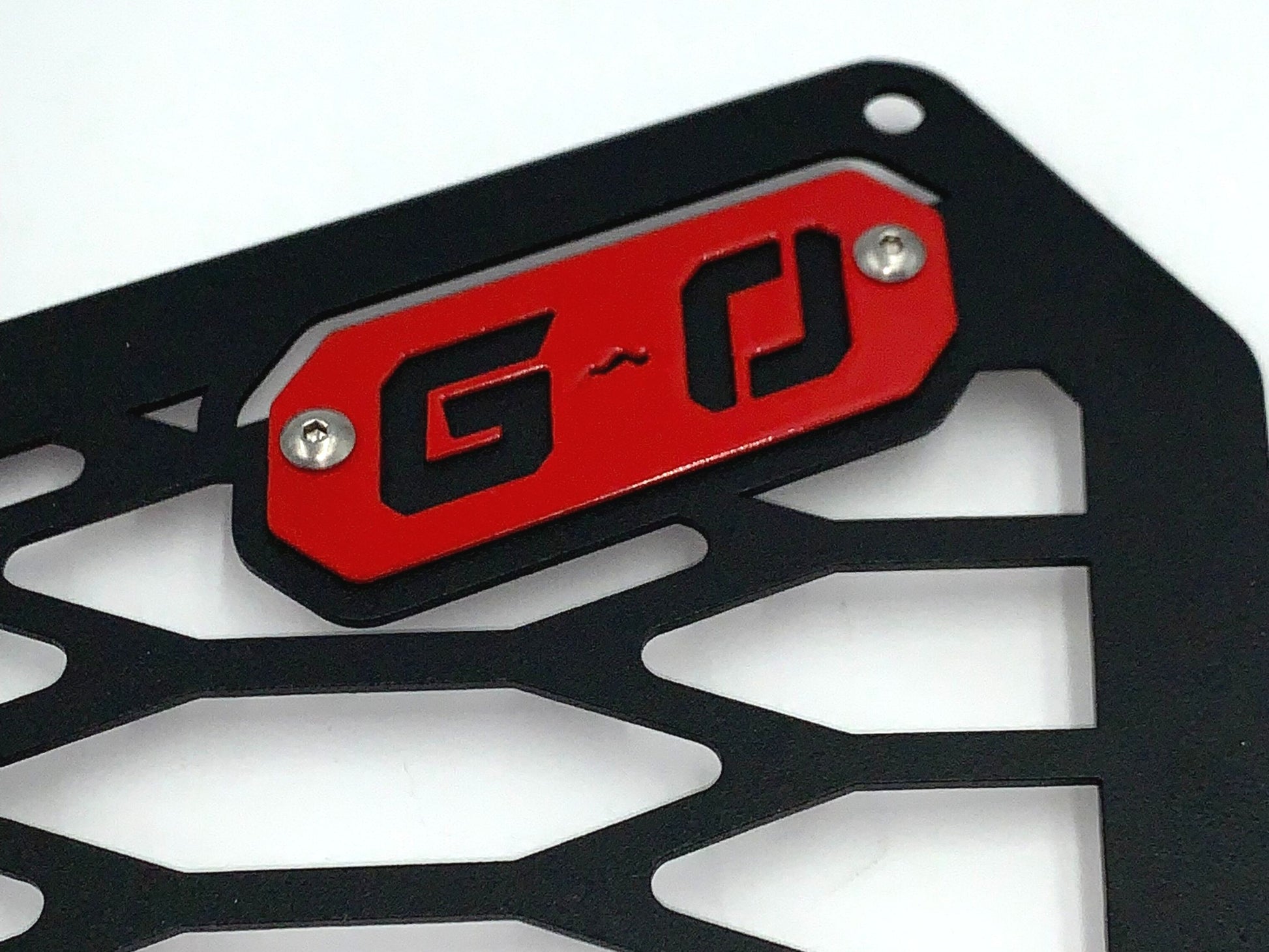 red greanland offroad logo on can am x3 grille