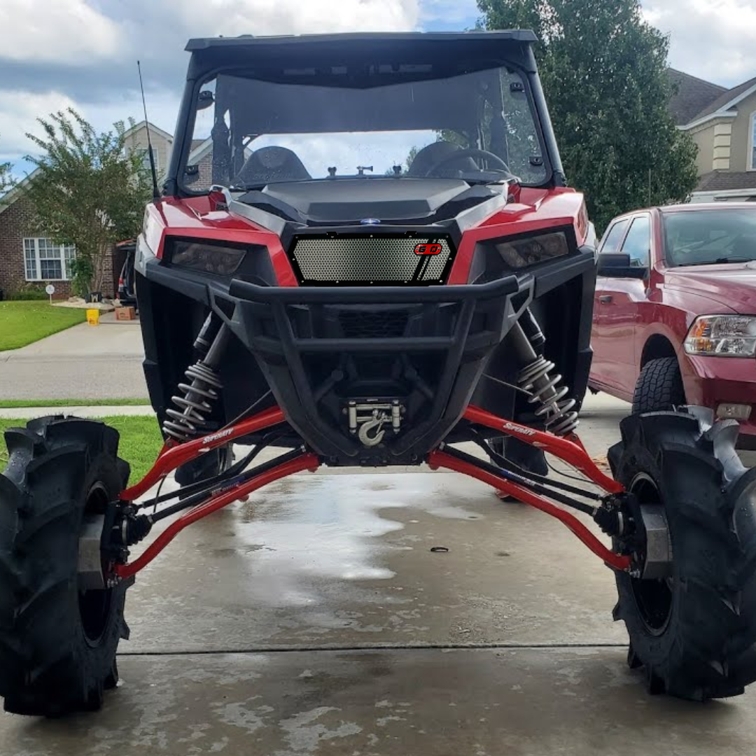 red greanland grille on lifted red polaris general