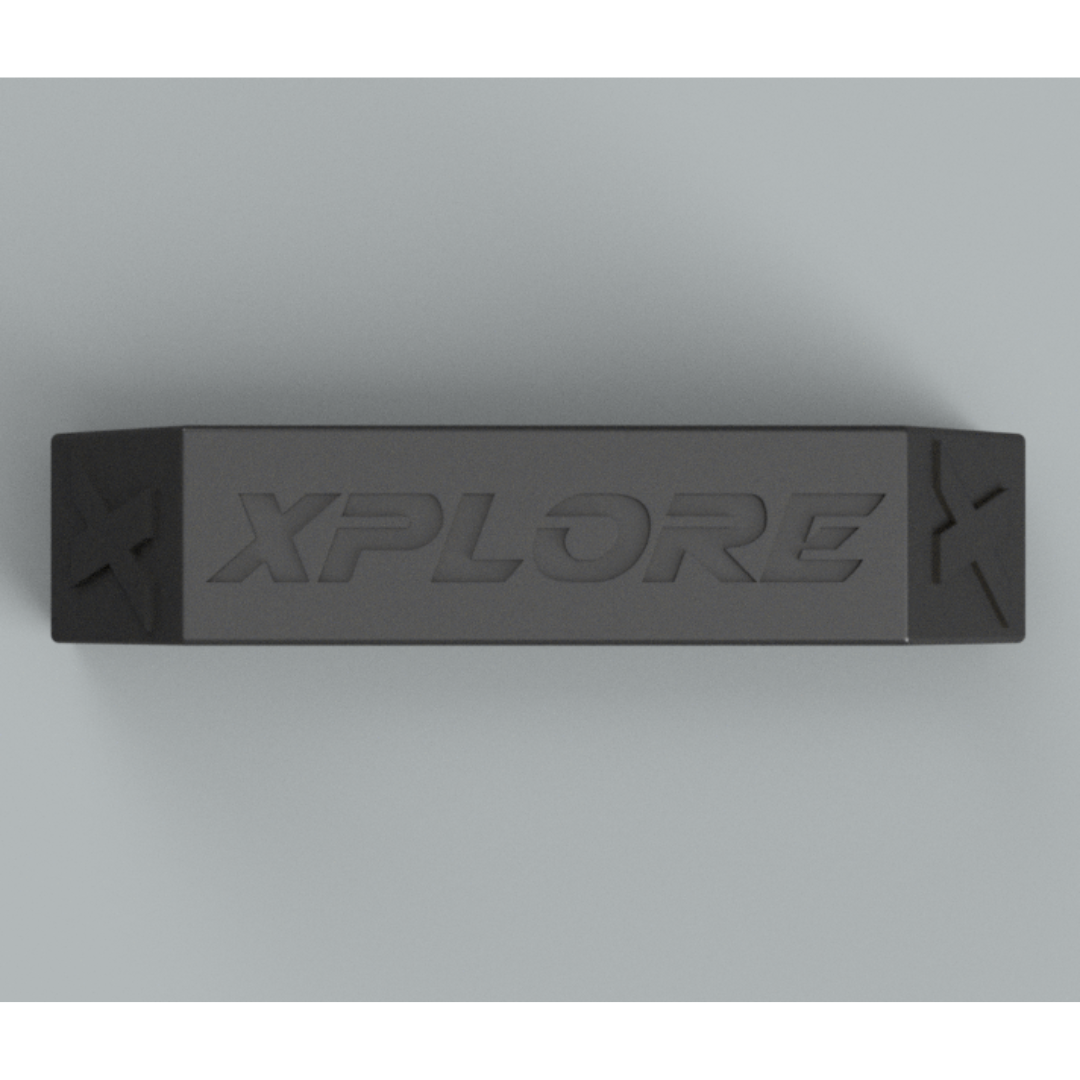 Black rectangular eraser with 'XPLORE' branding on a gray background